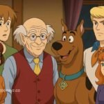 Scooby Doo gang with elderly man, Wallace smiling indoors