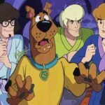 Scooby Doo Unmasked with Batman and the gang during sunset adventure